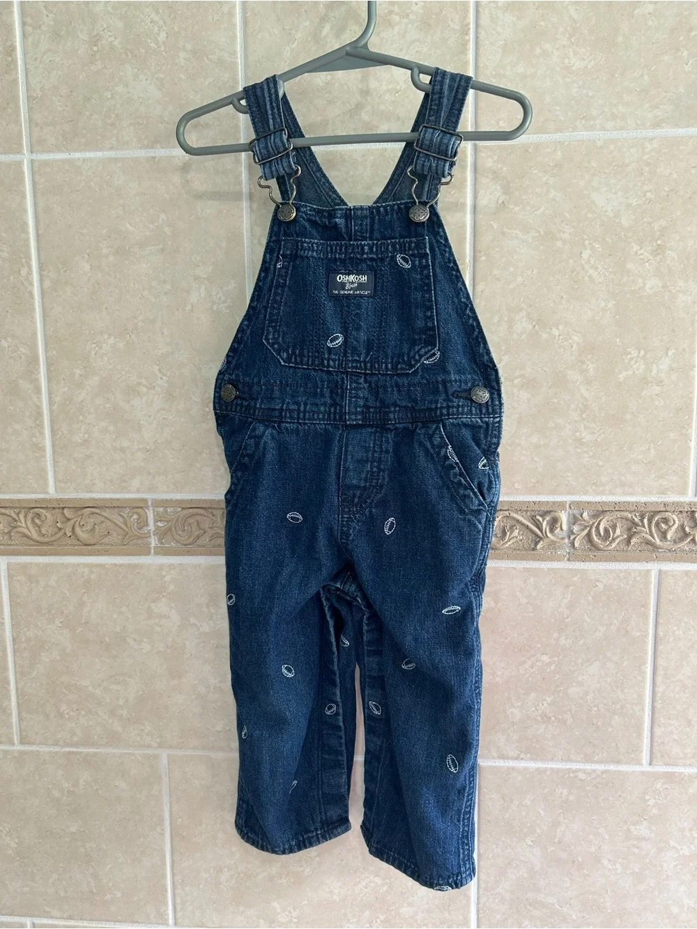 OshKosh Denim overalls with footballs
